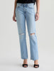 Light blue jeans with slight distressing on a white background