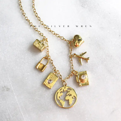 SILVER WREN MULTI CHARM TRAVEL NECKLACE